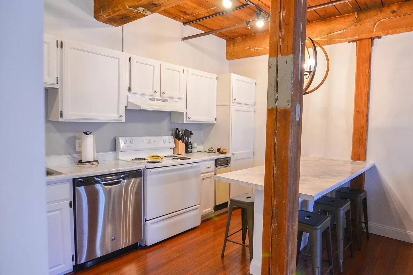 Kitchen with exposed timber beams